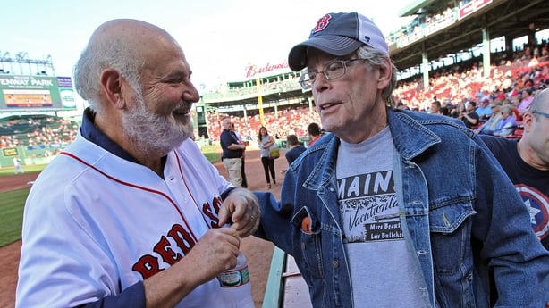 Rob Reiner talks with Stephen King before an MLB game in June 2014
