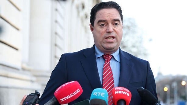 Minister Martin Heydon speaking to reporters outside Government Buildings