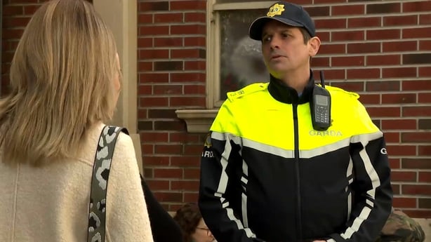 Garda Knowles approaches Zoe and Holly