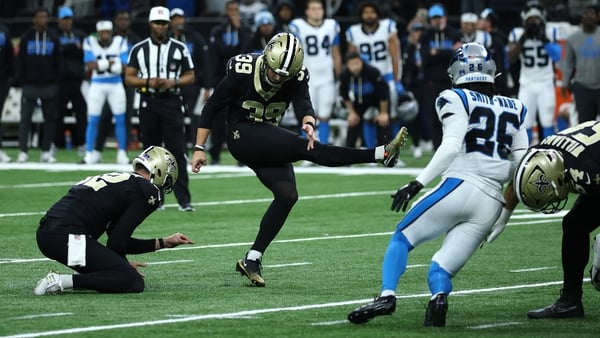 NEW ORLEANS, LOUISIANA - DECEMBER 14: Charlie Smyth #39 of the New Orleans Saints kicks a field goal against the Carolina Panthers during the fourth quarter at Caesars Superdome on December 14, 2025 in New Orleans, Louisiana. (Photo by Chris Graythen/Gett