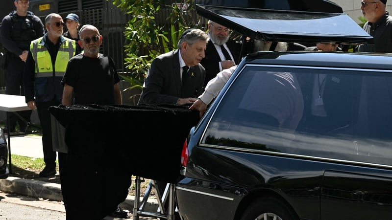 The coffin of rabbi Eli Schlanger is seen at his funeral at the Chabad of Bondi in Sydney