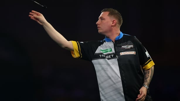 LONDON, ENGLAND - DECEMBER 16: Chris Dobey of England in action during day six of the 2025/26 Paddy Power World Darts Championship at Alexandra Palace on December 16, 2025 in London, England. (Photo by Warren Little/Getty Images)
