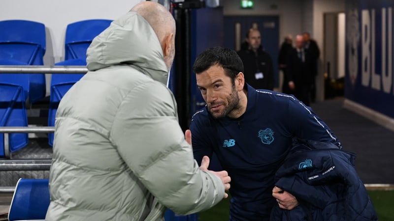 Cardiff City manager Brian Barry-Murphy, right, shakes hands with his Chelsea counterpart Enzo Maresca ahead of the Carabao Cup quarter-final at Cardiff City Stadium