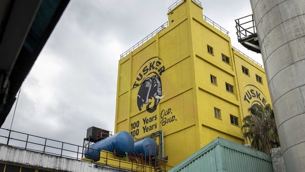 An image of a yellow East Africa Breweries plant