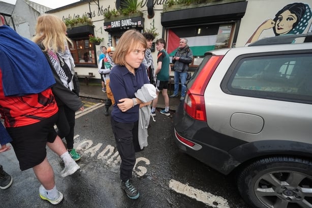 Greta Thunberg joins runners who have taken part in the Kneecap 10 charity run, outside Bang Bang cafe Phibsborough. Kneecap member Naoise O Caireallain (Moglai Bap) held a 10K charity run from from Dalymount Park to the Aras in Dublin, to raise funds for the Gaza Food and Play Project, which delive