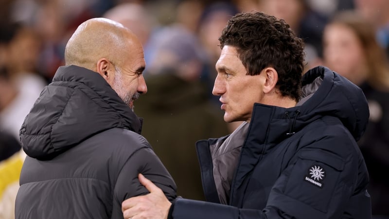 Former Ireland midfielder Keith Andrews (R) and Brentford are just six points off the top five