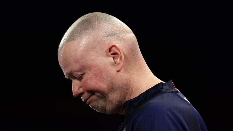A dejected Raymond van Barneveld during defeat to Stefan Bellmont