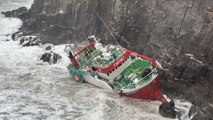 Heavy seas preventing attempts to assess the damage to a French trawler in Dingle show image