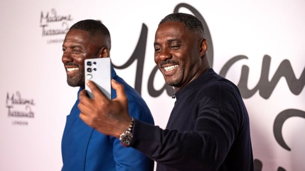 Idris Elba poses for a selfie with his waxwork at Madame Tussauds