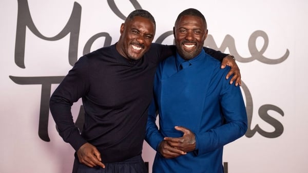 Idris Elba poses for a photo with his waxwork at Madame Tussauds