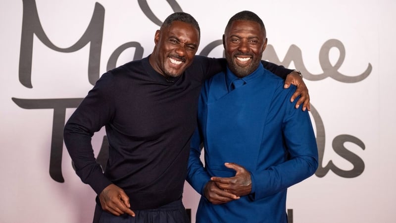 Idris Elba poses for a photo with his waxwork at Madame Tussauds