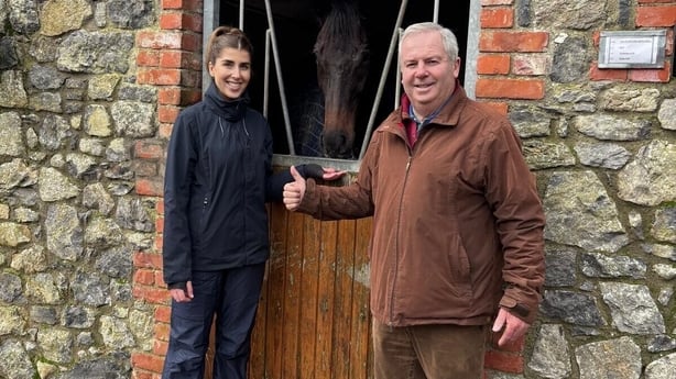 Eric and Kate McNamara seen smiling in the yard