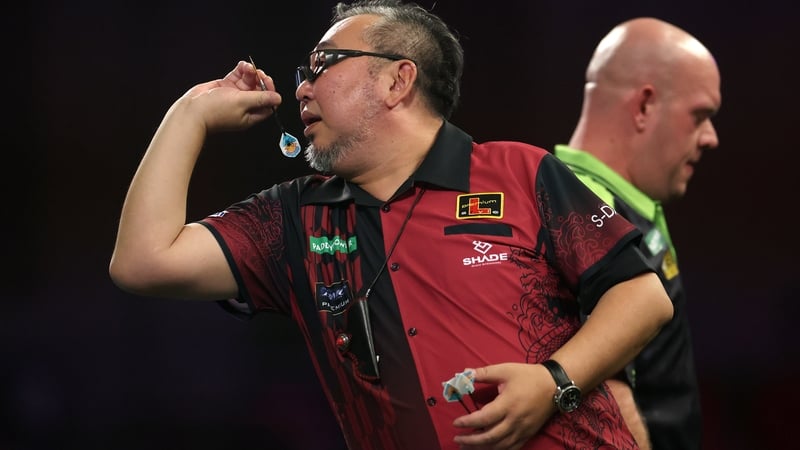 Japan's Mitsuhiko Tatsunami in action during his first-round defeat to Michael van Gerwen