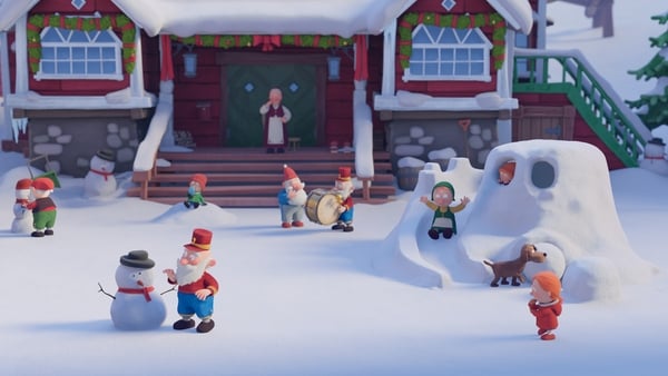 A snowy Christmas scene from an animation with Elves playing.