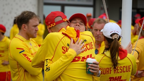 SYDNEY, AUSTRALIA - DECEMBER 20: Hundreds of surf rescuers participate in a Shoulder2Shoulder memorial event for victims of the December 14 terrorist attack at Bondi Beach on December 20, 2025 in Sydney, Australia. Life slowly returned to normal at Bondi