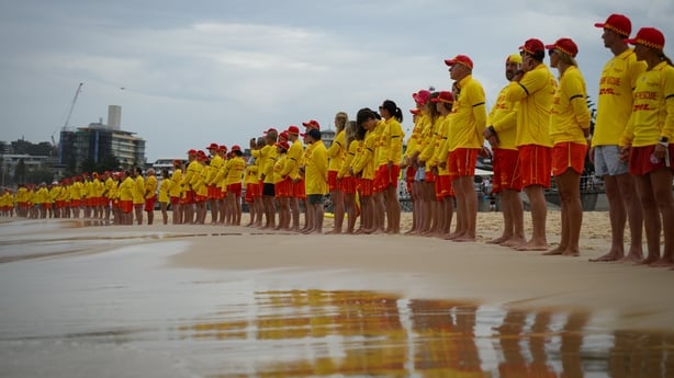 Hundreds of surf rescuers participate in a Shoulder2Shoulder memorial event for victims of the terrorist attack at Bondi Beach