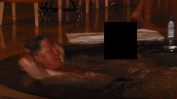 Picture shows Bill Clinton in a jacuzzi
