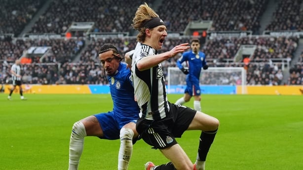 Chelsea's Malo Gusto (l) and Newcastle United's Anthony Gordon battle for possession - Premier League, December 2025