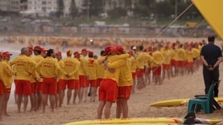 Australian lifeguards line Bondi Beach to honour victims