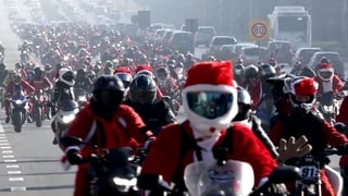 Hundreds of motorbike-riding Santas ride through Sofia