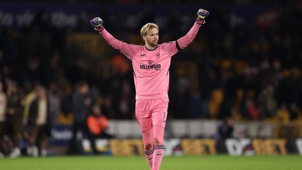 Caoimhin Kelleher celebrates teammate Keane Lewis-Potter of Brentford (not pictured) scoring the teams second goal during the Premier League match between Wolverhampton Wanderers and Brentford at Molineux on December 20, 2025 in Wolverhampton, England. (P