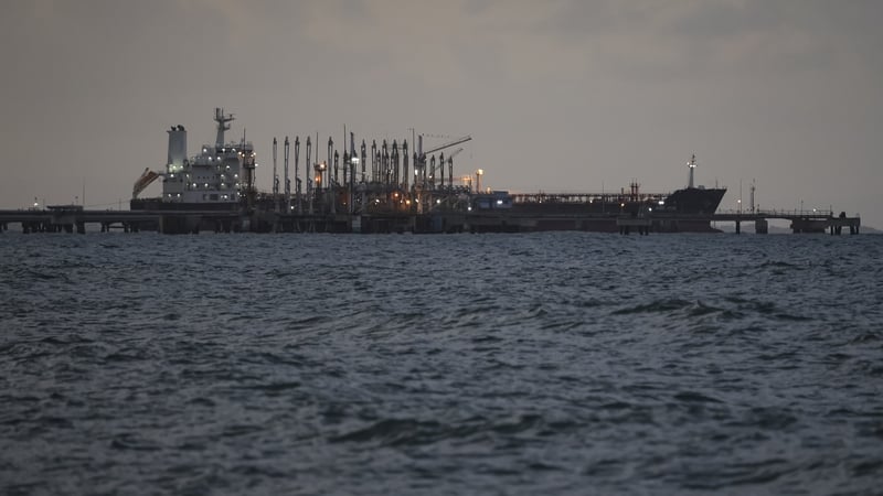 An oil tanker anchored at a dock in Puerto Cabello, Venezuela