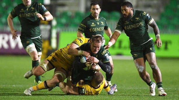 20 December 2025; Sam Gilbert of Connacht is tackled by Harri Keddie of Dragons during the United Rugby Championship match between Dragons and Connacht at Rodney Parade in Newport, Wales. Photo by Kian Abdullah/Sportsfile