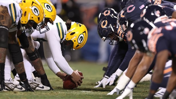 CHICAGO, ILLINOIS - DECEMBER 20: A detail of Chicago Bears and Green Bay Packers helmets at the line of scrimmage during the first quarter at Soldier Field on December 20, 2025 in Chicago, Illinois. (Photo by Michael Reaves/Getty Images)
