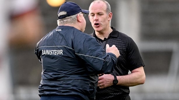 21 December 2025; Loughrea manager Tom Kelly in conversation with referee Johnny Murphy after the AIB GAA Hurling All-Ireland Senior Club Championship semi-final match between Loughrea of Galway and Slaughtneil of Derry at Parnell Park in Dublin. Photo by Ramsey Cardy/Sportsfile
