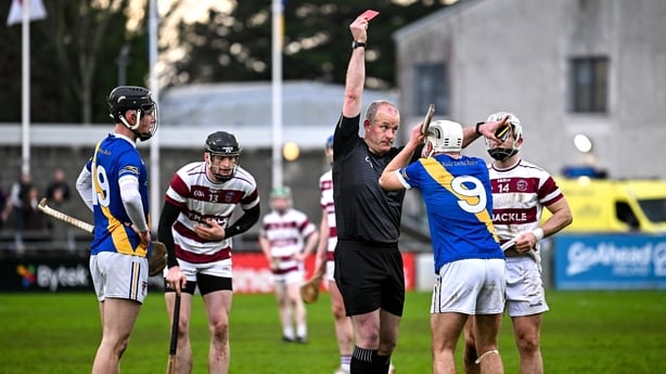 Referee Johnny Murphy shows a red card to Cullen Killeen of Loughrea at the end of All-Ireland club semi-final against Slaught Néill