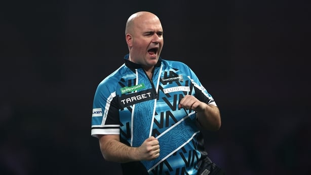 LONDON, ENGLAND - DECEMBER 21: Rob Cross of England celebrates against Ian White of England (not pictured) during the Round Two match between Rob Cross and Ian White during Day Eleven of the 2025/26 Paddy Power World Darts Championship at Alexandra Palace on December 21, 2025 in London, England. (Ph