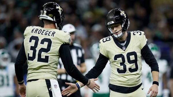 Kai Kroeger #32 and Charlie Smyth #39 of the New Orleans Saints celebrate after Smyth's field goal against the New York Jets in the first quarter of a game at Caesars Superdome on December 21, 2025 in New Orleans, Louisiana.