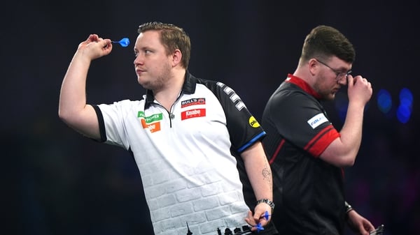 Germany's Martin Schindler (left) in action against Keane Barry at 2026 World Championships