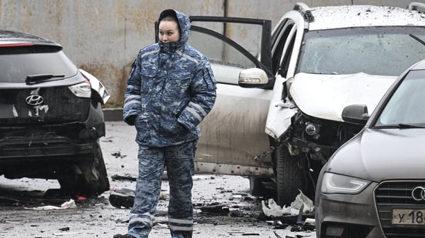 An investigator works at the car blast site in southern Moscow
