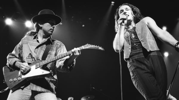 The Edge and Bono of U2 perform on the Joshua Tree Tour at Nassau Coliseum in 1987