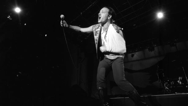 U2's Bono on stage at Sullivan Stadium in Foxborough, MA in 1987