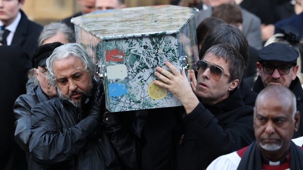 Alan Wren aka Reni of The Stone Roses and Liam Gallagher help carry the coffin at the funeral of The Stone Roses' Gary Mounfield, also known as Mani, at Manchester Cathedral on 22 December, 2025
