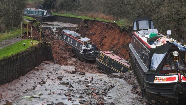 Several boats are seen stranded after a sinkhole opened at the canal in Shropshire