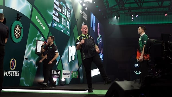 Michael van Gerwen of the Netherlands reacts during his second round match against William O'Connor of Ireland