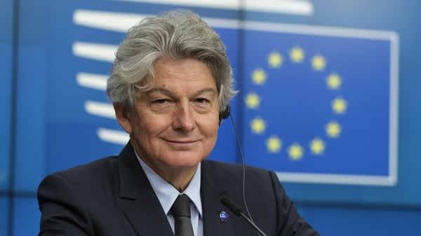 Thierry Breton in front of the EU logo