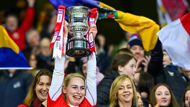 Sarah Gormally of Kilkerrin-Clonberne lifting the All-Ireland cup in 2024