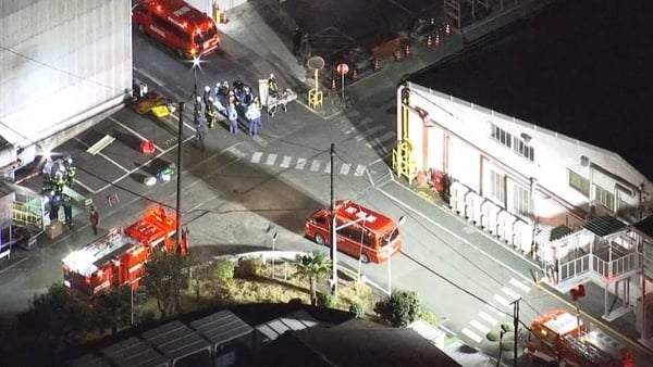 Emergency services arrive at factory in Japanese city of Mishima after reports of stabbing attack