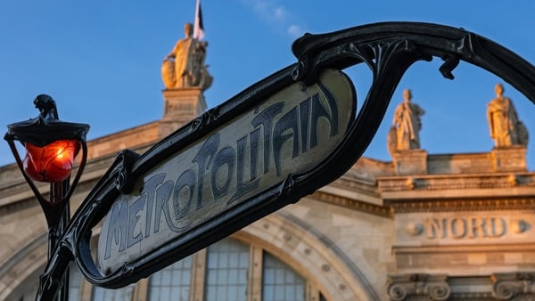 This photograph taken on September 18, 2025, shows the Art Nouveau sign for the Metropolitain Paris underground station