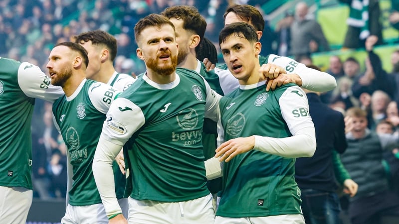Jamie McGrath (r) celebrates scoring Hibs' opener in their 3-2 win over their Edinburgh rivals
