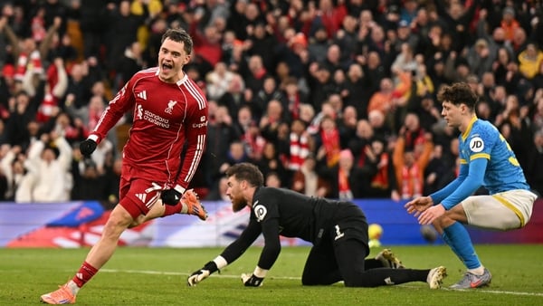 Liverpool's German midfielder #07 Florian Wirtz celebrates after scoring their second goal during the English Premier League football match between Liverpool and Wolverhampton Wanderers at Anfield in Liverpool, north west England on December 27, 2025.