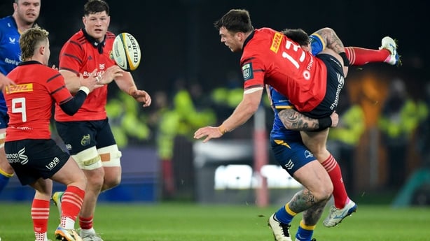 27 December 2025; Tom Farrell of Munster is tackled by Andrew Porter of Leinster during the United Rugby Championship match between Munster and Leinster at Thomond Park in Limerick. Photo by Brendan Moran/Sportsfile