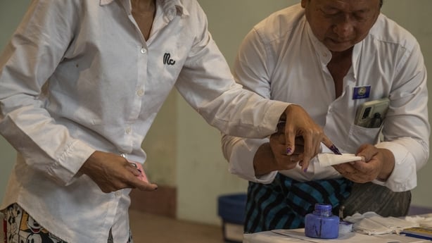 a voter got a finger inked after casting a vote for Myanmar's general election 