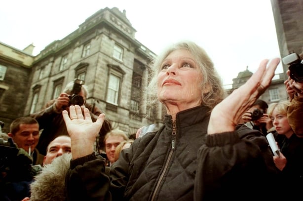 French movie legend turned animal rights campaigner Brigitte Bardot celebrates outside Edinburghs High court after Woofie the condemmed dog was saved from Death Row. Photo by David Cheskin/PA