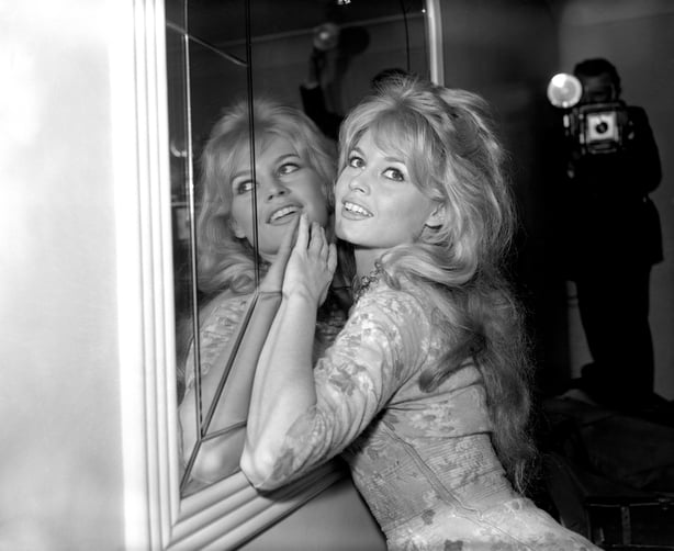 Brigitte Bardot at a London Hotel during a photocall after arriving in from Paris to start location shooting for her latest movie "Babette Goes to War"