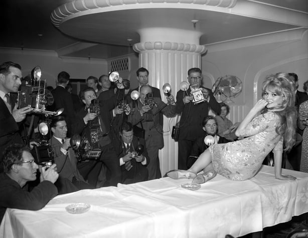 Bardot at a London Hotel during a photocall after arriving in from Paris to start location shooting for her latest movie "Babette Goes to War"
